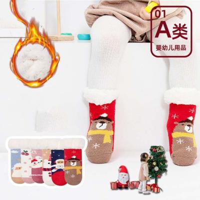 China New HY-844 Christmas series QUICK DRY autumn and winter thickened velvet coral children's floor socks baby glue sleep socks for sale