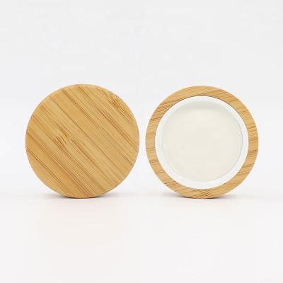 China Eco-Friendly Custom Cosmetic Natural Dark Wood Lid Round Shaped Honey Glass Jar Grain Accessory Wooden Lid for sale