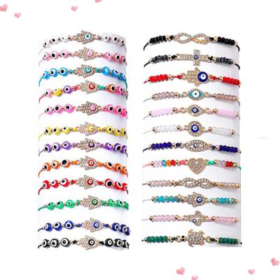 China Women's Amazon hot sale alloy rhinestones hand eye beaded rope bracelet, fashion personality men and women lovers hand rope for sale