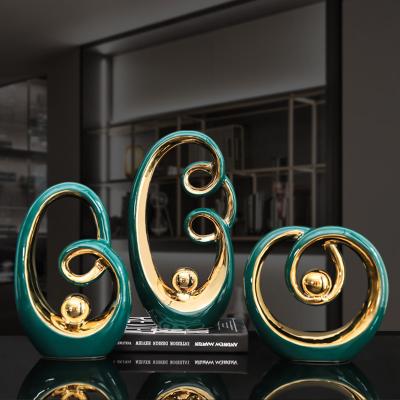 China Modern Nordic Living Room Bedroom Interior Home Decoration Creative Green Porcelain Statue Modern Gold Ceramic Abstract Art Decoration for sale