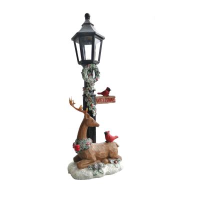 China Eco - Friendly Creative Resin Welcome Deer And Birds Street Lamp Red Christmas Lantern With Led Lights for sale