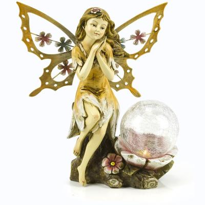 China China Garden Resin Figurine Fairy Statue Solar Light with Color Changing LED Crackled Glass Globe for sale