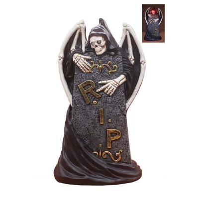 China Eco - Friendly Resin Death 's Skull LED Halloween Figurine With Tombstone for sale