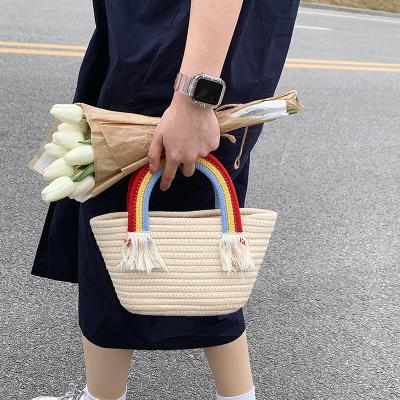 China And beautiful of urban simplicity fresh cotton woven joker seaside holiday beach bag rainbow bucket straw handbag new for sale