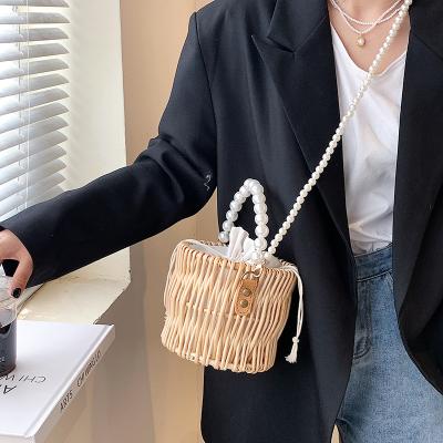 China Others New Art Vintage Rattan Handbag Pearl Chain Shoulder Messenger 2022 Summer Straw Bag Women for sale