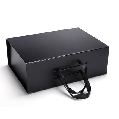 China Disposable Custom Printed Black Paper Gift Box With Ribbon Closure Paper Box Packaging for sale