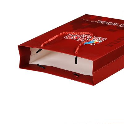 China Eco-Friendly Manufacturers Sell Customizable Logo Red Paper Packaging Bags For Packaging Products for sale