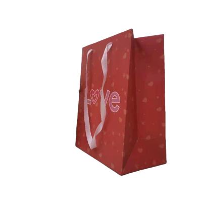 China Recyclable Price Optimization Red Luxury Portable Gift Bag Valentine's Day Gift Packaging Bag for sale