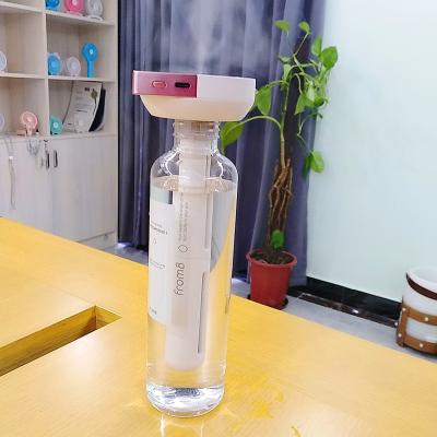 China Quick Humidification 2 in 1 Desktop Handheld Mist Water Bottle Portable Cool Humidifier Multicompatible for sale