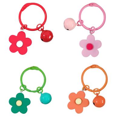 China Plastic New Korean Simple Candy Color Small Flower Bells Keychain Bag Pendant Flower Keychains for sale