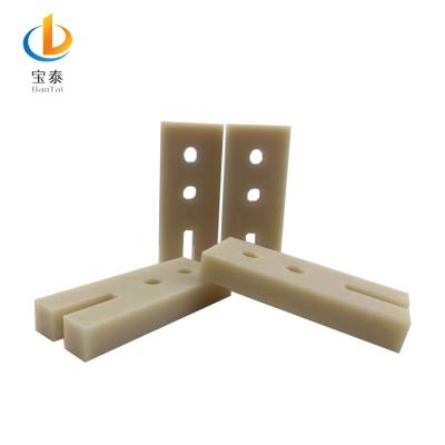 China Building material shops nylon slide block, cushion plate, linear guide rail, customized plastic parts, open mold injection for sale