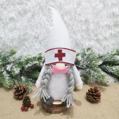 China 2022 Polyester+fiber New Year Santa Claus Faceless Doll Red Cross Party Decoration Cute Portable Plush Doll Ornaments for sale