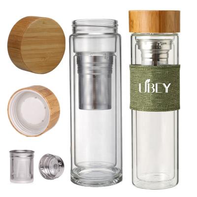 China Sustainable Double Wall Bamboo Water Bottle Tea Glass Bottle Bamboo Lid Around Bottom Cups Drinking for sale