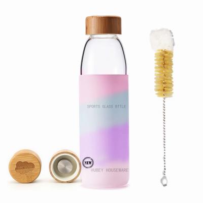 China Custom Logo Sustainable Lids 500ml BPA Bamboo Borosilicate Glass Glass Free Bottle For Water With Silicone Sleeve for sale