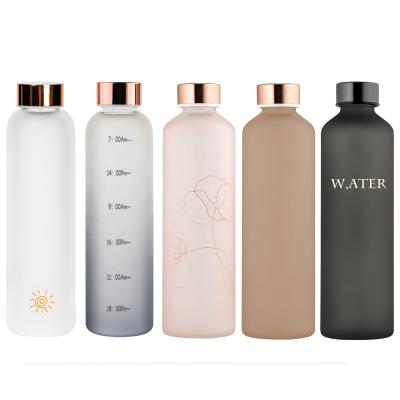 China Sustainable Personalized Simple Modern Frosted Bottle Glass Water Bottles With Time Reminder for sale