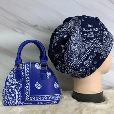 China Vintage Paisley Bandana Print Fabric Bucket Purse Set Designer Cashew Flower Handbag Cross - Body Shell Purse Chian and Hat Set 2021 for sale