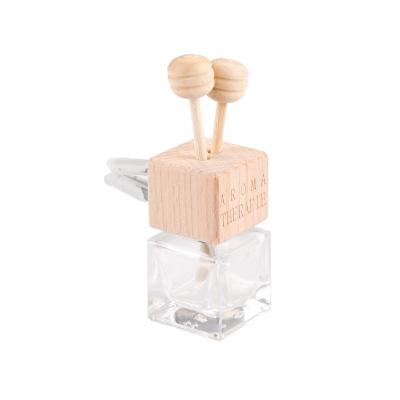 China Personal Care In Stock Square 5ml Glass Perfume Essential Oil Diffuser Car Air Freshener Bottle With Clips for sale