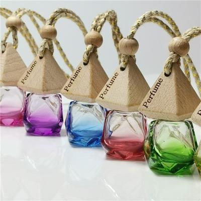 China Wholesale Empty Car Perfume Bottle Personal Care Car Hanging Glass With Lid 8ml Shape Glass Perfume Essential Oil Wood Geometric Diffuser for sale