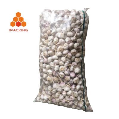 China 25kg 50kg Recyclable Clear Polypropylene Woven Cloth Storage Bag Garlic Packaging Potato Onion Bags for sale