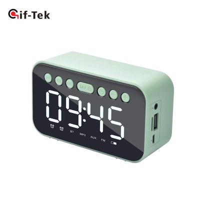 China Wireless Alarm Clock Fm Radio BTS Wireless Charging Speaker With Microphone for sale