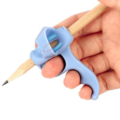 China Children Pen Grips New Promoted Silicone Rubber Corrects Student Children's Habits Pencil Enrollment Grip The Latest Five Finger Gripper Penguin Pen Grip for sale