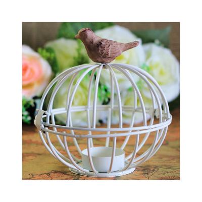 China Home American Birdcage Iron Bird Resin Country Decoration Candle Holder European Wedding Candle Holder for sale