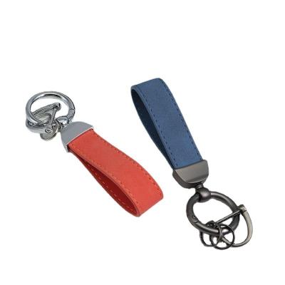 China Hot Selling Small Car Pendant Keychain Gift High Quality Leather Car Key Key Chains For Men And Women for sale