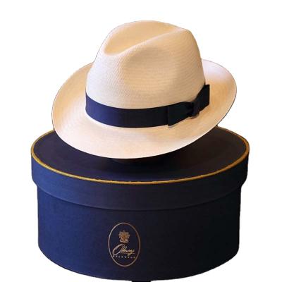 China Handmade Custom Round Hat Boxes Panama Straw Hat Favor Box Packaging With Rope Handle for sale