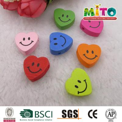 China Eco - Friendly Mixed Painted Heart Shaped Decorative Wooden Beads for sale