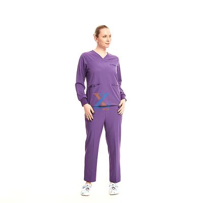 China Breathable/Comfortable/Absorb Sweat/Fashions/2021 Fashions Hospital Nurse Work Suit Sets Professional Jogger Stretch Clothes Beauty Salon Medical Spa Scrub Purple Uniforms for sale