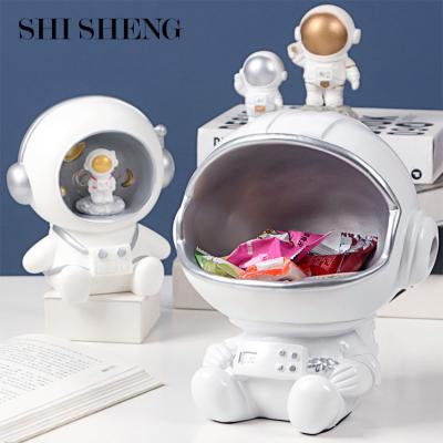 China SHI SHENG Luxury Astronaut Desktop Ornaments Eco-friendly Furniture Snack Sundries Main Storage Box For Living Room Decoration for sale