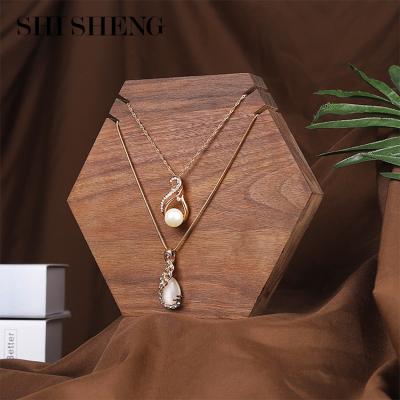 China Vintage SHI SHENG The New Listing Walnut Hexagon Wooden Jewelry Ring Necklace Holder Display Stand for Home for sale