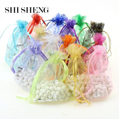 China Morden SHI SHENG 7*9/9*12cm Custom Drawstring Organza Jewelry Bags For Wedding Gift Jewelry Display Packaging Pouches for sale