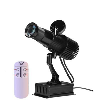 China Energy Saving Model 30w Indoor Projector Non-waterproof Black Color Gobo Spotlights Advertising Projection Lamp for sale