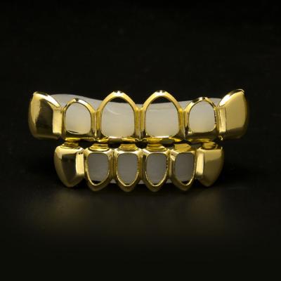 China High Quality Top and Bottom18k Real Hollow Brass Gold Hiphop Grillz Fashion Batter Braces Set For Teeth for sale