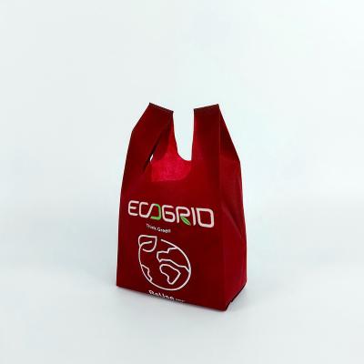 China Eco - Friendly Customizable Biodegradable T - Shirt Bag Non - Woven Vest Shopping Bag for sale