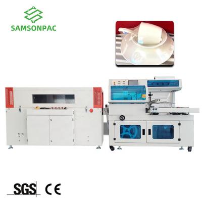 China Samsonpac Automatic Pillow Profile Tunnel PVC pp Film Cucumber Bottle Heat Shrink Sealing Long Food Wrapping Packing Machine for sale