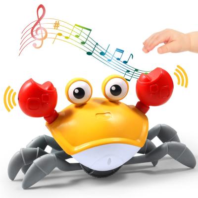 China Baby Runaway Avoidance Control Automatic Electric Induction Electric Obstacle Sensor Interactive Walking Crawling Sensing Crab Toy with Music Light for sale