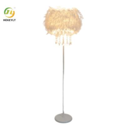 China Feather Crystal Floor Lamp Wedding Living Room Bedroom Bedside Lamp Beauty Anchor Fill Light for sale