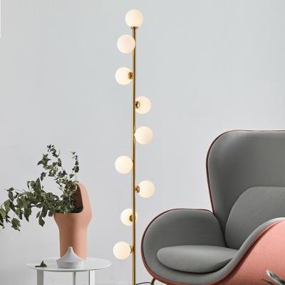 China Nordic Simple Glass Ball Standing Lamp Modern Personality Bedroom Living Room Floor Lamp for sale