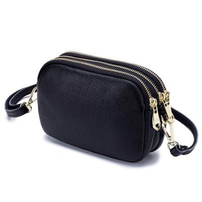 China GENUINE LEATHER Soft Three-Layer Lady Messenger Bags Genuine Leather Zipper Mobile Phone Bag Cowhide Messenger Bag for sale