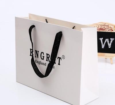 China Handmade Custom Logo Print Wholesale Grocery White Brown Packaging Paper Gift Bag With Handle Industrial Item Outer Packaging for sale