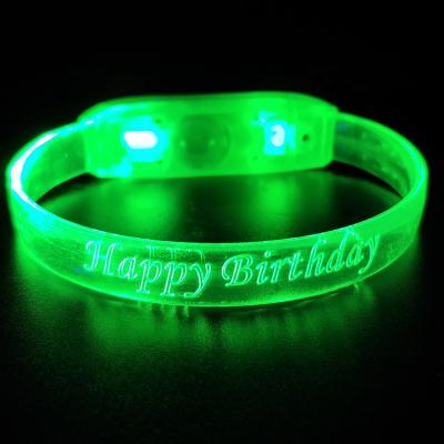 China Custom Multicolor TPU 2021 Flat Fiber Optic Music Logo Flashing Light Arm Wristband Activated LED Wristband Bars Events Gift for sale