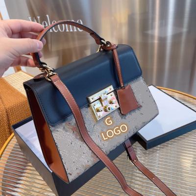 China Online Celebrity L Designer Shoulder Bag Handbag Fashion Flip Genuine Leather 2021 New Fashion Bag For Women for sale