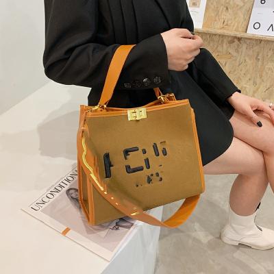 China 2022 fashion brand new cheap price fashion style color cloud shoulder clips handbag large capacity tote bag for sale