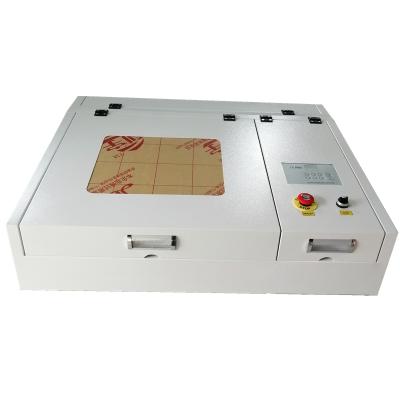 China Laser Engraving Hot Sale 50W SP-4040 Laser Cutting and Engraving Machine CO2 Laser Cutter, DIY Laser Marking Machine CNC with CE Certificate for sale