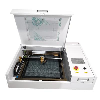 China Laser Engraving Hot Sale Small Laser Engraver CO2 Engraving Machines For Home Business With 400*400mm Worktable for sale