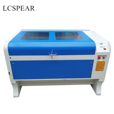 China Laser Engraving M2 CO2 Laser Cutting Machine 1060 With 1000*600mm Thru Working Table And Reci 100w Laser Tube for sale