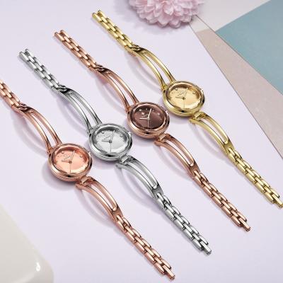 China Water Resistant Women Crystal Diamond Watches Fashion Quartz Female Stainless Steel Dress Strap Luxury Wrist Watch for sale