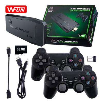 China Multi Players M8 2.4G Gamepad Controller 32GB Memory 4K HD Wireless Game Stick Built-in Support 3500 TV Video Games Console for sale